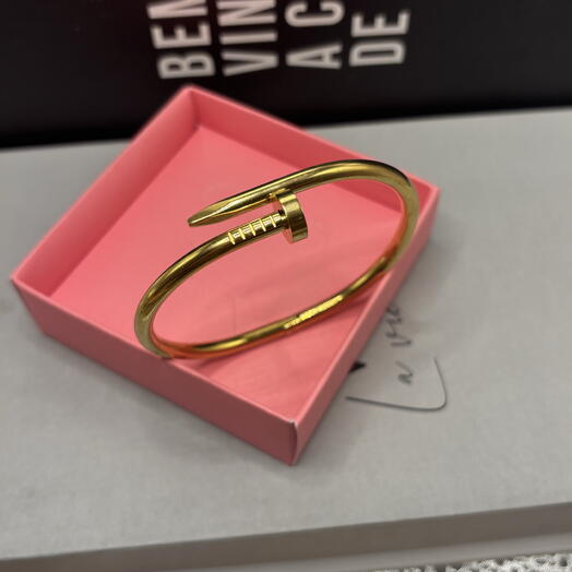 Bracelete prego aço dourado
