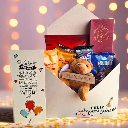 Cesta Chocolates, Guloseimas e Cacau Show "Feliz Aniversario" com Urso